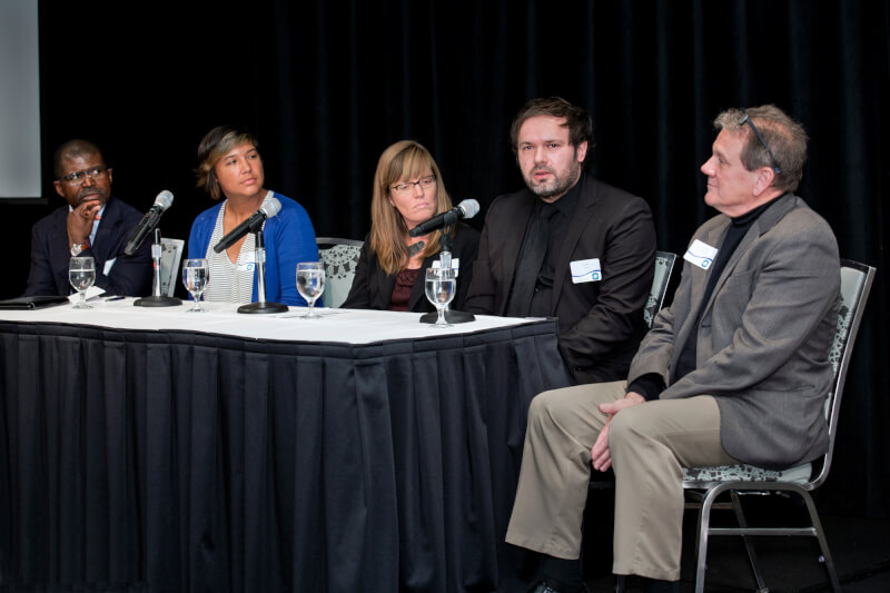A photo of panelists.