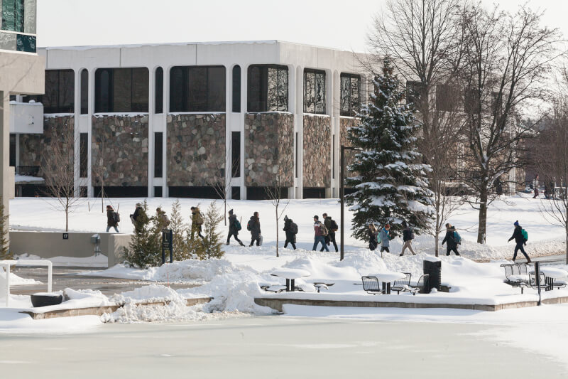 The campus building schedule for the semester's end is posted.