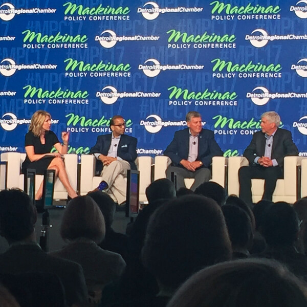 five people on stage