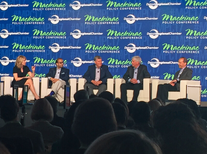 five people on stage