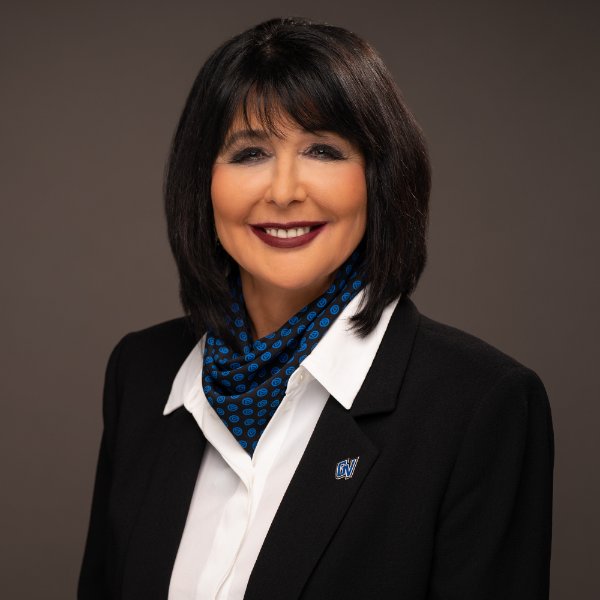 President Philomena V. Mantella smiling for a photo.