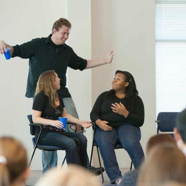 Members of the theater education group ReACT! perform scenes on campus that aim to help prevent incidents of dating and domestic violence, sexual assault and stalking. (Photo/Amanda Pitts)