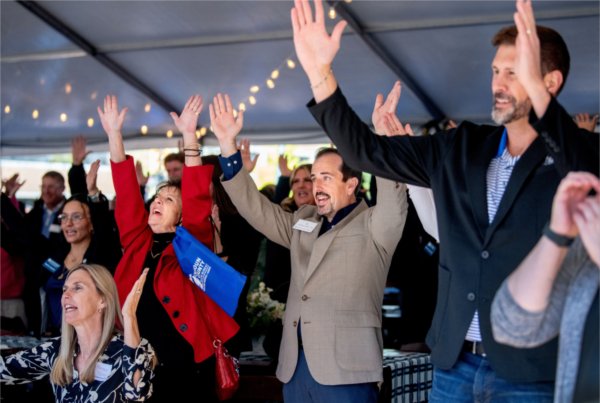 At center is Al Shifflett, director of Southwest Michigan, with his mother, Kathy Shifflett, and at right is Chris Overbeek, GVSU alumnus who works at the Omni Community Credit Union in Battle Creek.