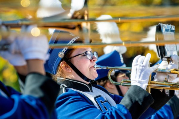 Laker Marching Band trombone player, in line of trombone players