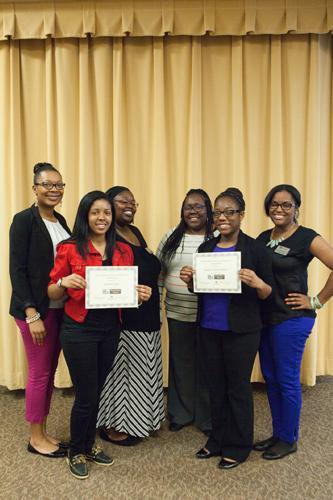 Members of Positive Black Women are pictured with scholarship recipients at the 2015 Celebrating Women Awards reception. Nominations for this year's event are due by February 22.