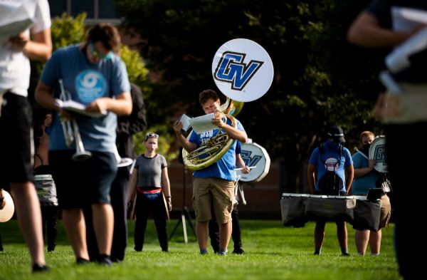Members of the band study notes.