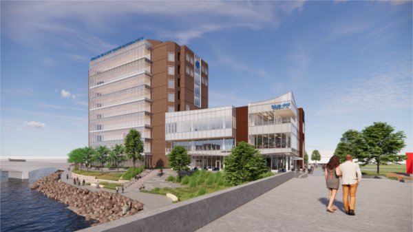 A rendering shows a building with the words Blue Dot Innovation Lab and Grand Valley State University.