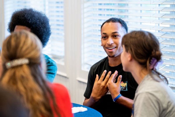 Participants in the Talking Together workshop discuss an issue.