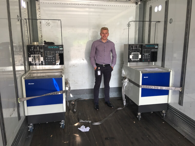 Ben Eastburg with the two machines