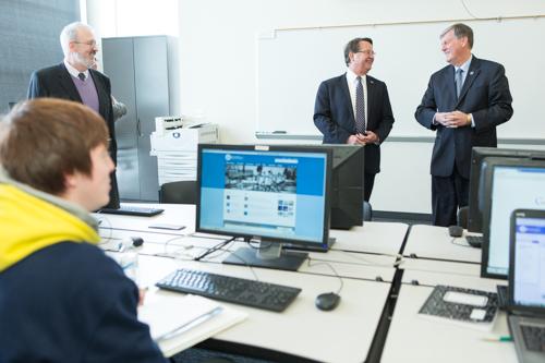 From left, Padnos College of Engineering and Computing Associate Dean Charlie Standridge, U.S. Sen. Gary Peters and Grand Valley President Thomas J. Haas.