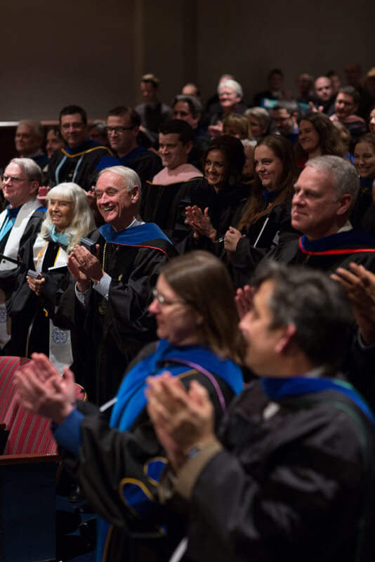 group of people clapping