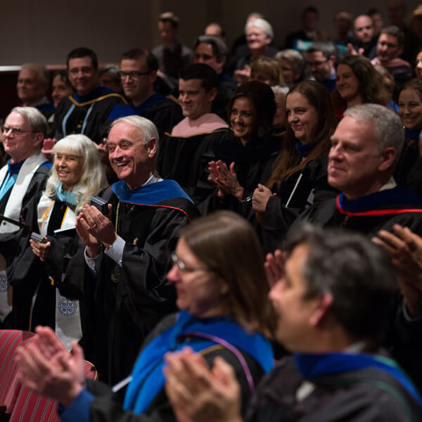 group of people clapping