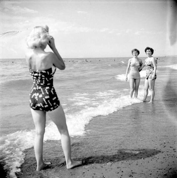 women on the beach, mid-century photo
