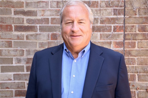 Steven Workman in blue blazer and blue shirt