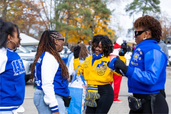 Alumni reconnect during the tailgate.