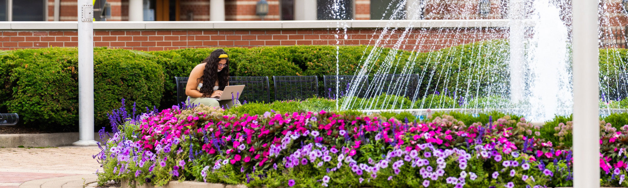 Student studying outdoors.