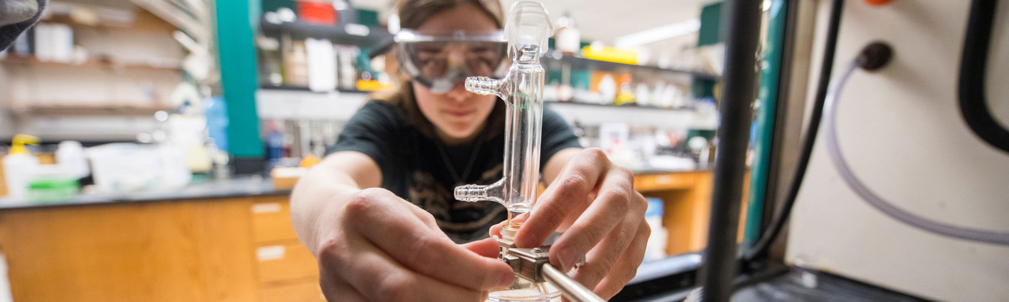 Photo of a Chemistry student in one of GVSU's state-of-the-art chemistry labs.
