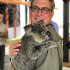 Anthony Thompson holding a Koala