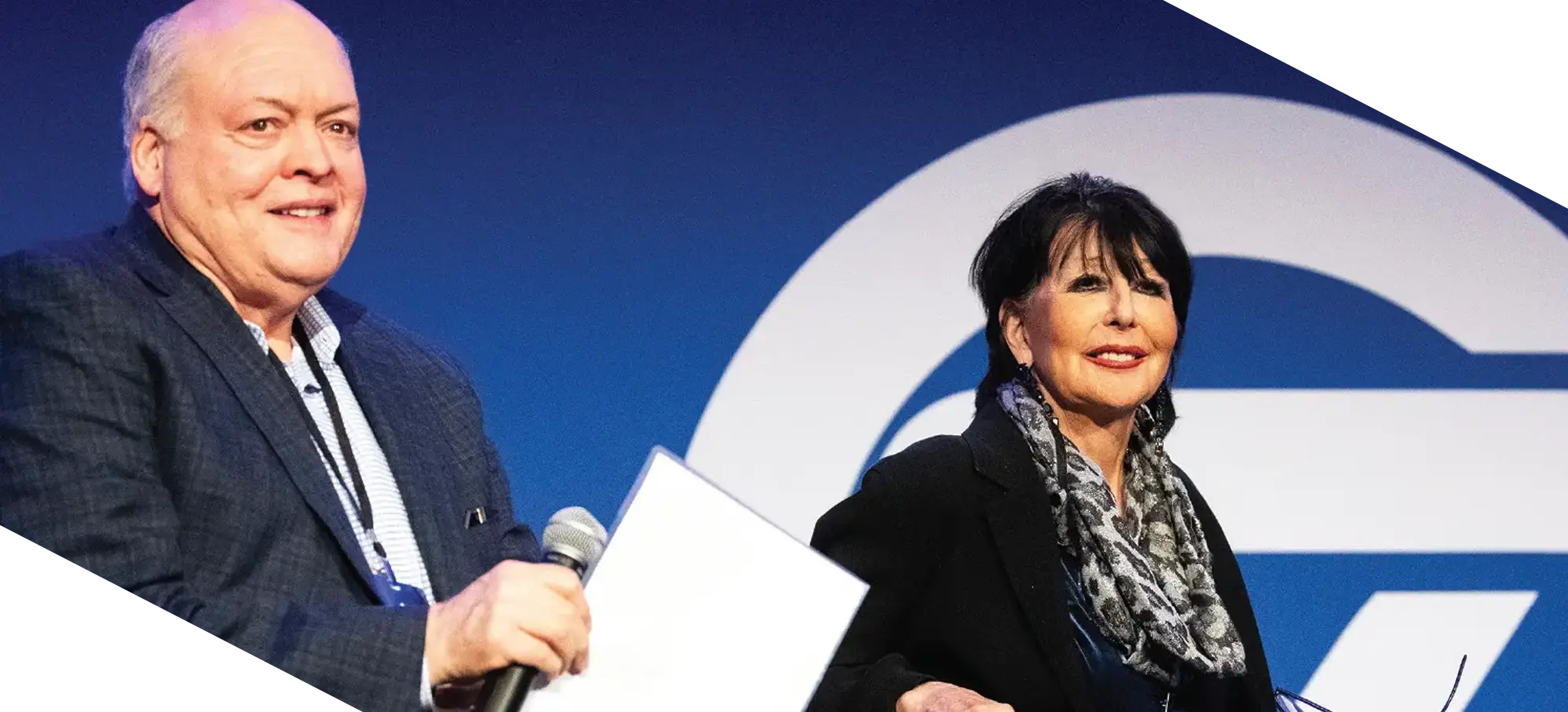 Jim Hackett and President Philomena V. Mantella hold a thoughtful conversation on stage, highlighting the role of leadership in innovation and student success.