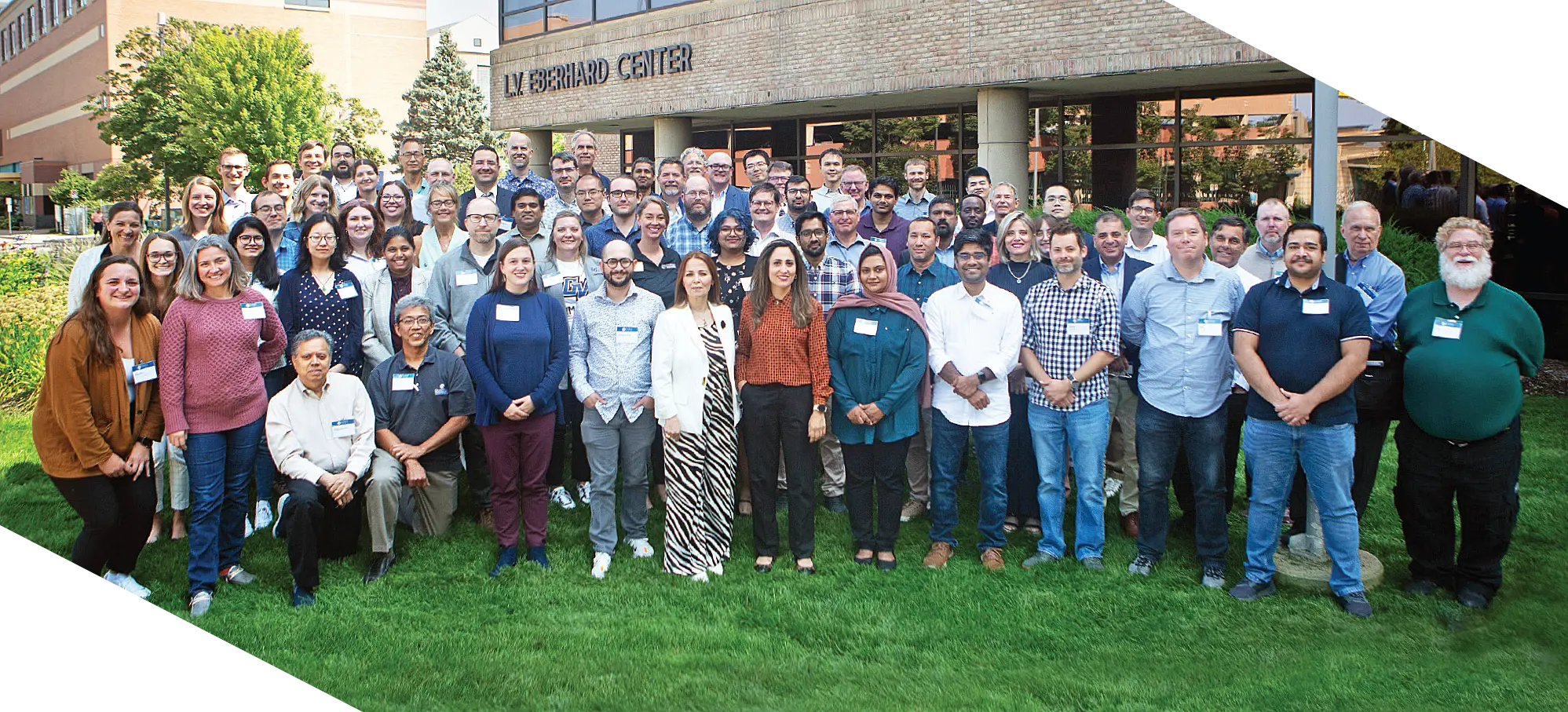 Faculty and staff from the College of Computing gather for a group photo outside the L.V. Eberhard Center during the college retreat hosted in August of 2024 prior to the fall semester in downtown Grand Rapids.